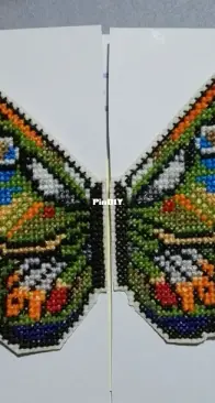 Cross stitch butterfly. Opens as a window to save inside  a notepad to an agenda or journal inside.
