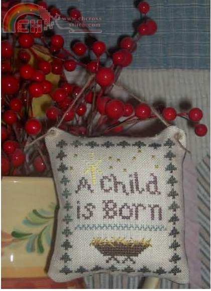 A_Child_is_Born_Ornament_cover.jpg