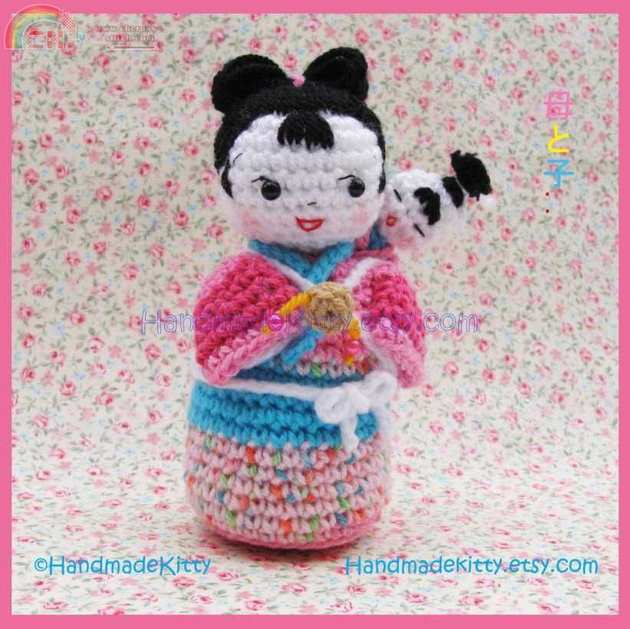 Japanese kokeshi mother and baby.jpg