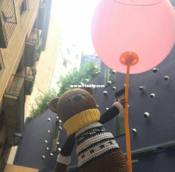 Little bear with balloon