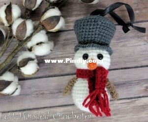 left handed crocheter - snowman ornament.JPG