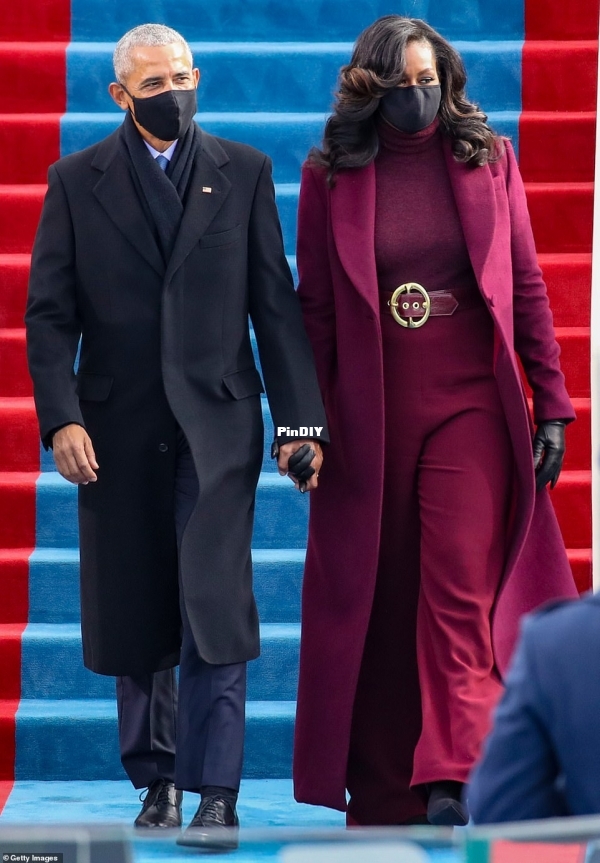 38258524-9168403-Michelle_Obama_cut_a_stylish_figure_in_head_to_toe_plum_at_Joe_.jpg