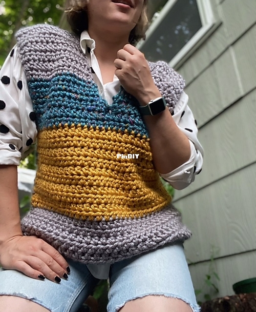 Fabulous_Sweater_Vest_elodie_front_arm_on_leg_medium2.jpg