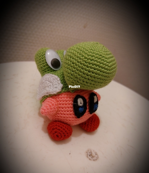 Kirby with yoshis hat