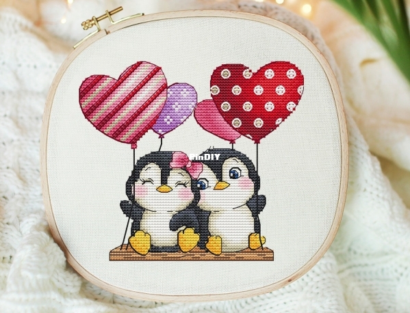 Penguins On A Swing.jpg