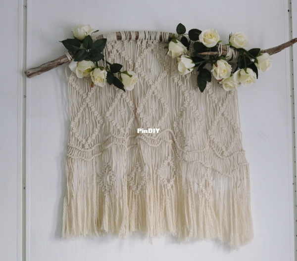 Macrame with roses on driftwood
