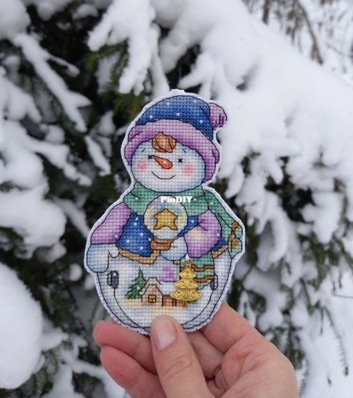Snowman with a ball by Elena Shestakova.jpg