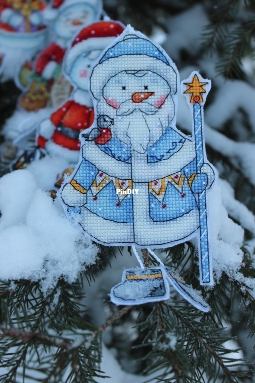 Santa Claus snowman. In a blue fur coat by Elena Shestakova.jpg