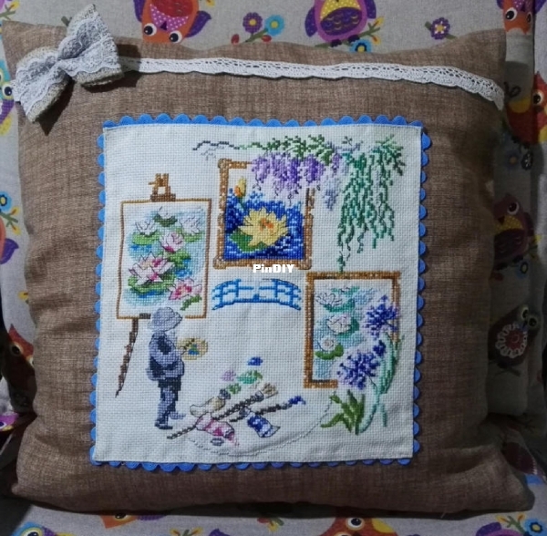 painter with paints. Point de croix magazine March April 2015