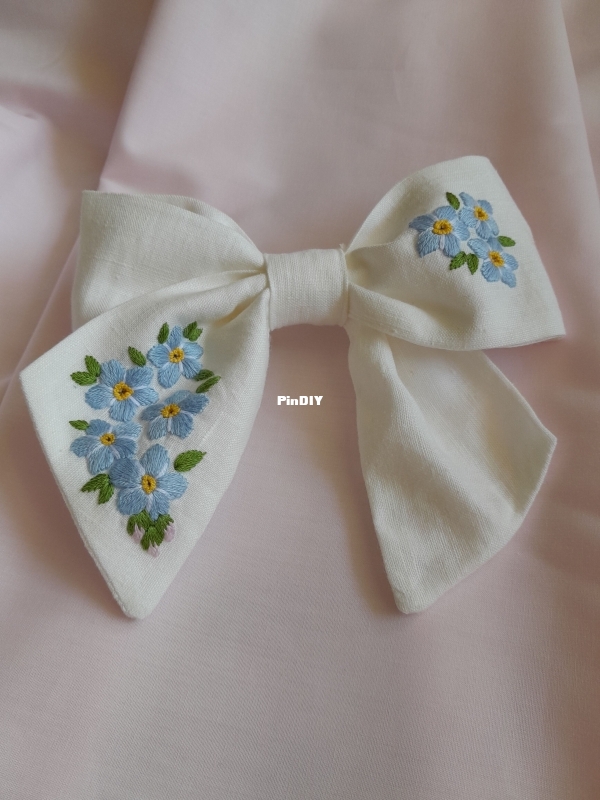 My first embroidered hair bow.jpg
