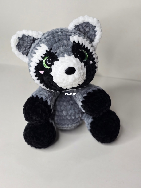 Snuggle Beans Crochet - Shannon Munro - Sploot series Raisin the raccoon.jpg
