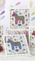 On Parade - Festive Fillies by Lesley Teare from Cross Stitch Gold 115 XSD