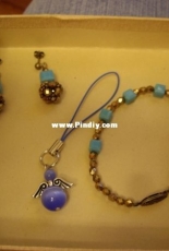 Conjunto dorado y turquesa