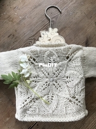 Happy floral baby cardi by Anne B Hanssen