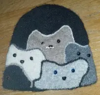 Cats on hat