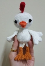 Amigurumi Chic with Blue Feather
