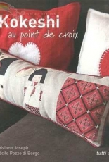 Kokeshi au point de croix