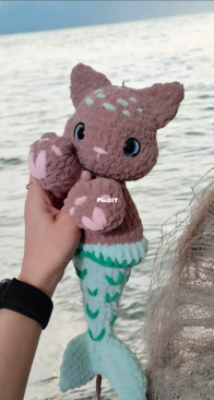 kitten with a fish tail