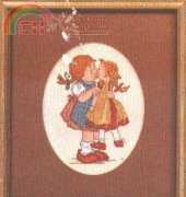 girl kissing doll