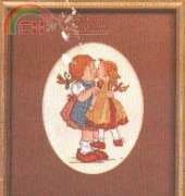 girl kissing doll