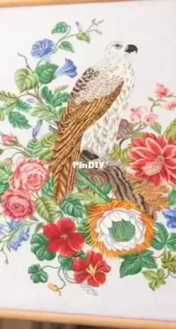 Designer Cross Stitch - A hawk in Flowers