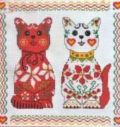 Two elegant cats by Iveta Hlavinova