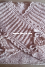 A top for a baby or a baby doll