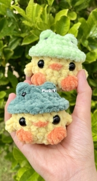 Crochet duckies with frog hat
