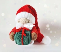 Crochet Wonders Design - Olga Kurchenko - Santa with a Gift 21 cm - English Translated