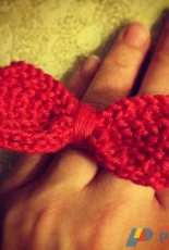 Ring with a bow