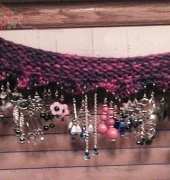 Knitted earring holder