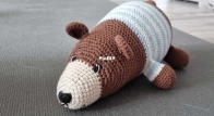 Lying bear