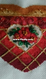 Embroidered but not sewn yet. Christmas tree toy.