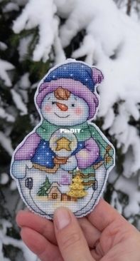 Snowman with a ball by Elena Shestakova