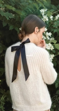 Big Bow Sweater by Olaug Beate Bjelland - Sandnes Garn - English