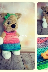 Plush cat in a dress