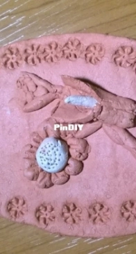 a little picture in clay