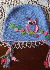 Blue hat with owl