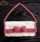 Unknown designer - White Crochet Clutch with Pink Bow - Free