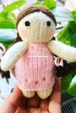 Knitted doll for photography