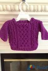 Noelle Stiles- Crown of Cables Baby Sweater- Free