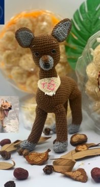 A crocheted puppy