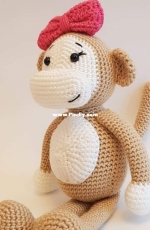 Monkey with pink bow