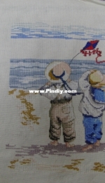 Two kids with a kite.