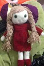 Doll with red dress