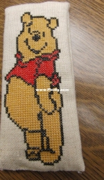 Winnie the pooh on lavender bag.