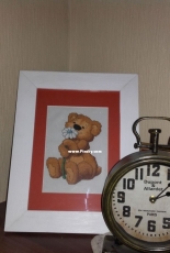 Little bear with flower