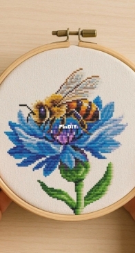Bee on a Flower by Lyubov Vodenikova