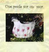 Un point c fou -Une poule sur un mur