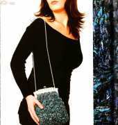 Chic Knits: Mix Novelty Yarns to Create 25 Ponchos, Capes, Tops & Purses by Maria Williams
